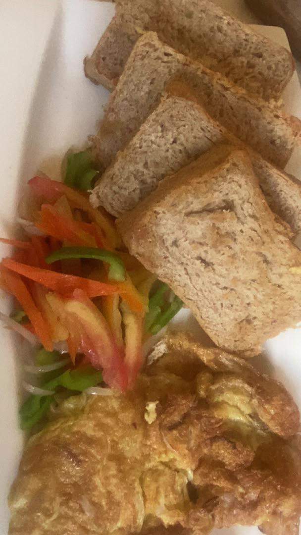 Sunrise Toast & Omelette — soft brown bread with fluffy golden omelette