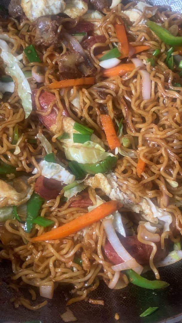 Wok-Tossed Noodles — with crisp vegetables, gizzard and sausage