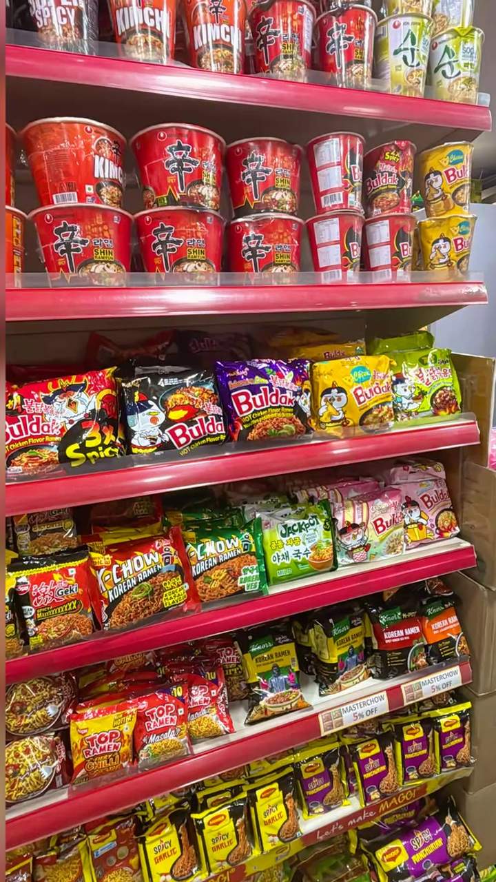 Asian noodle cups on a shop shelf